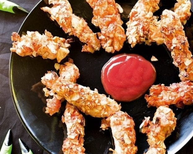 Halloween witches fingers with blood tomato sauce