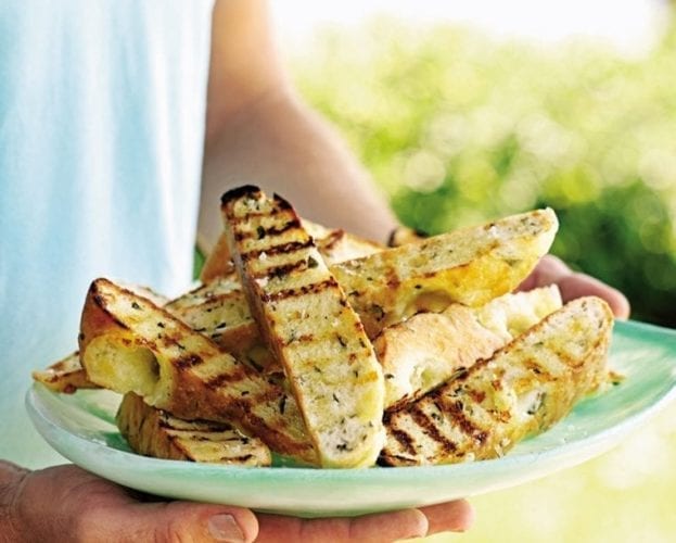 basil and mozzarella focaccia fingers on a plate
