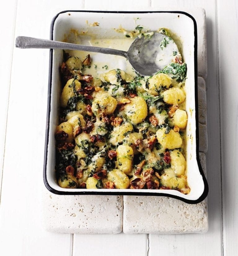Baked gnocchi with gorgonzola, spinach and walnuts