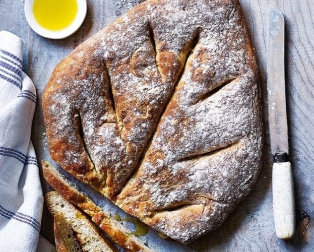 A baked Fougasse loaf, which resembles a leaf shape with veins cut in