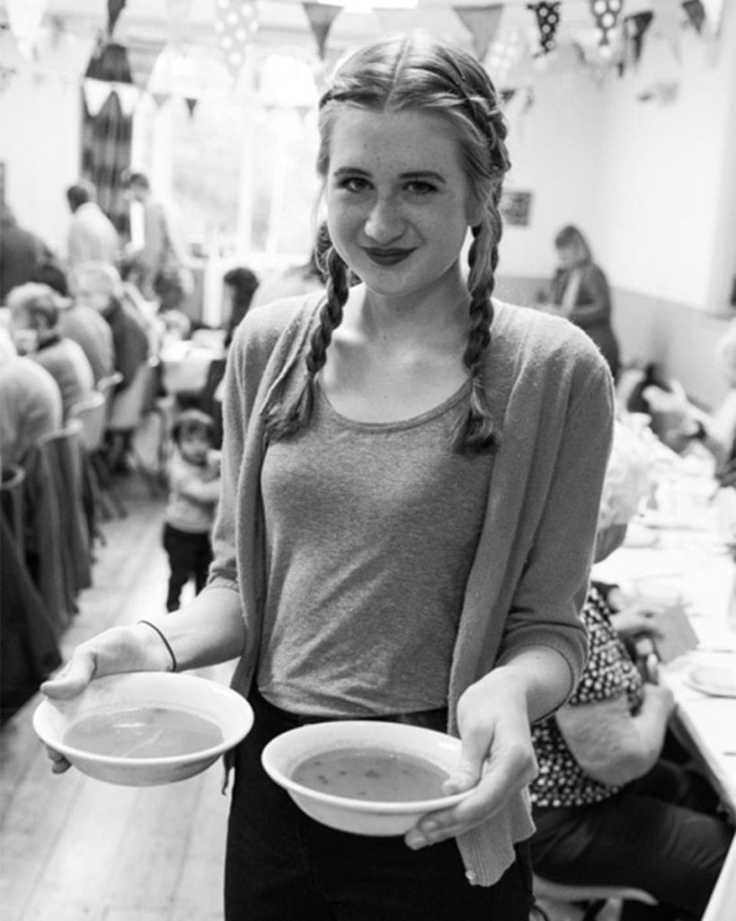 Teenage girl with soups