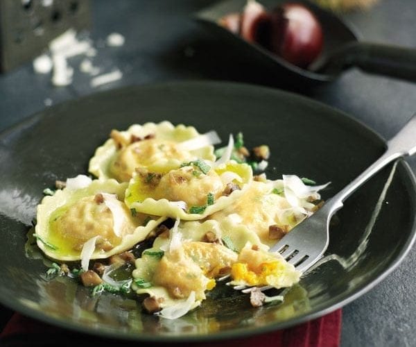 Squash ravioli with mushrooms and sage pesto