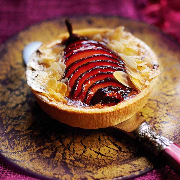 Chocolate tarts with mulled pears