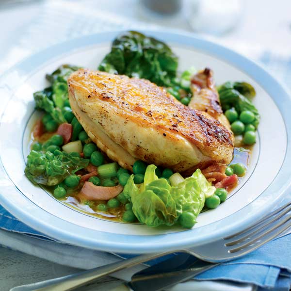 Pan-fried chicken with peas, bacon and lettuce