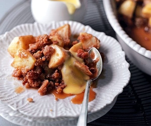 Apple crumble on a white plate