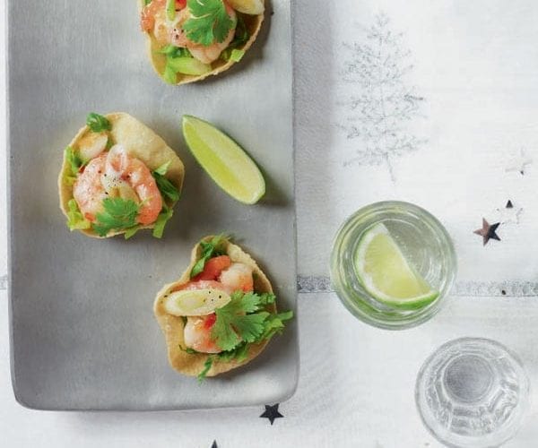 Prawn canapes - poppadoms - on a grey plate