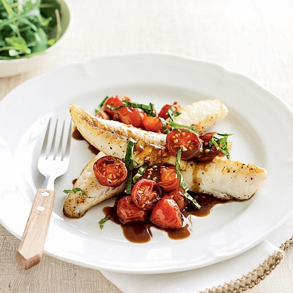 White fish with cherry tomatoes