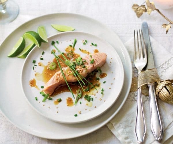 Poached salmon with soy, lime, spring onion and sesame seeds