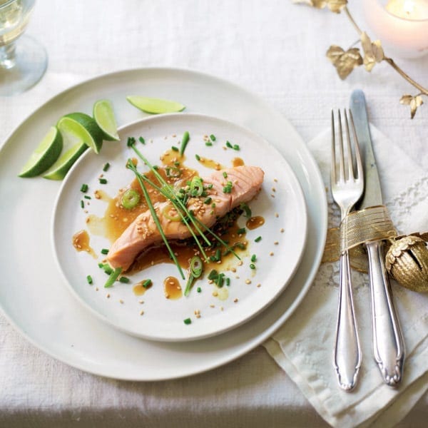 Poached salmon with soy, lime, spring onion and sesame seeds