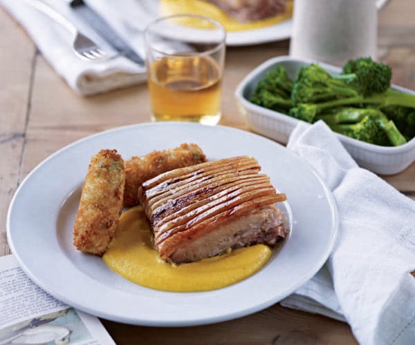 Pork belly with wild garlic croquettes, root veg purée and cider