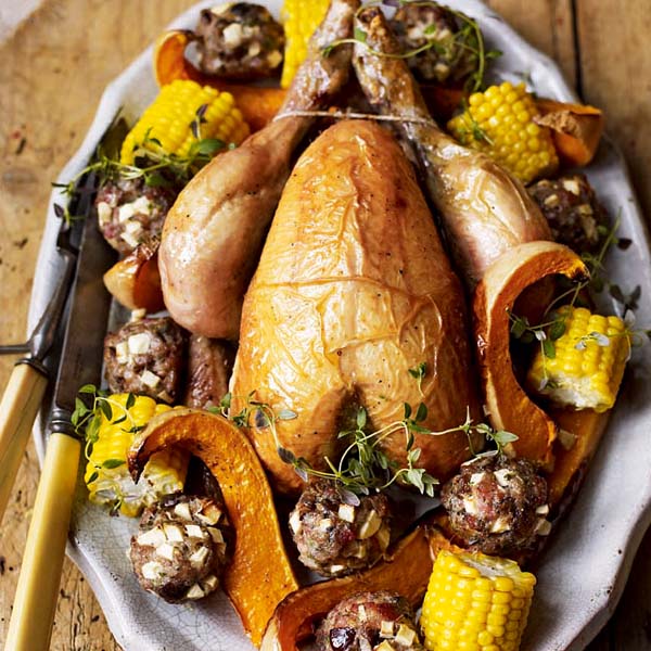 Roast chicken with chestnut and apple stuffing balls