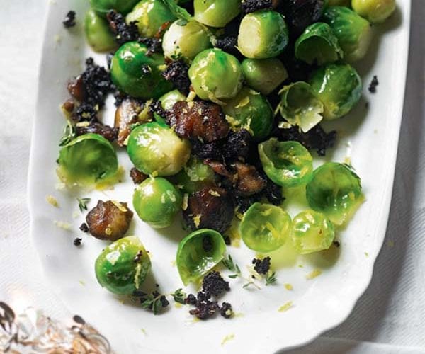 Sprouts and roasted carrots with butter and macadamia nuts