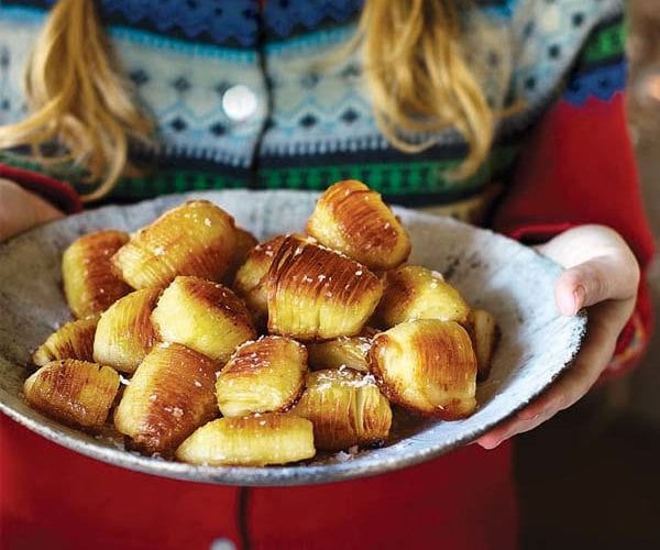 Hasselback potatoes in a bowl