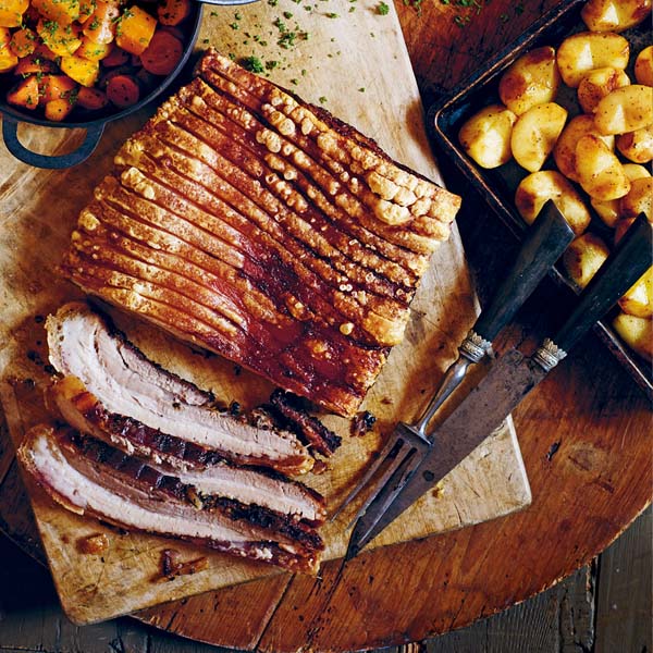 Slow-roasted pork with apples and cider gravy