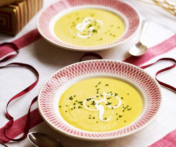 Parsnip and apple soup in red bowls