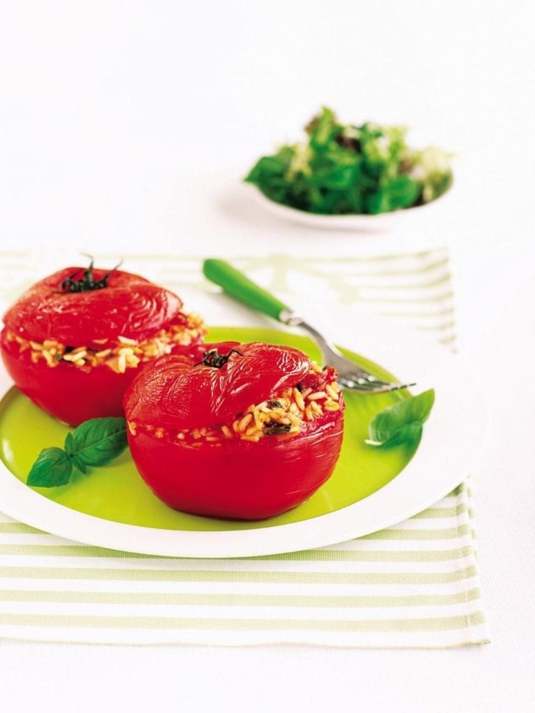 Baked stuffed tomatoes filled with lemon, basil and Parmesan rice