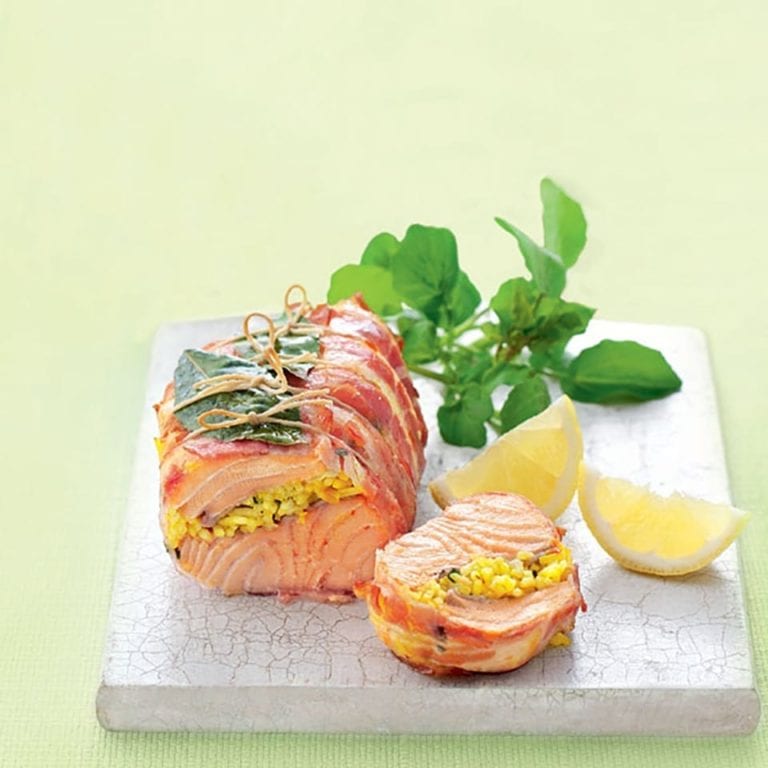 Pancetta-wrapped salmon with saffron and herb rice
