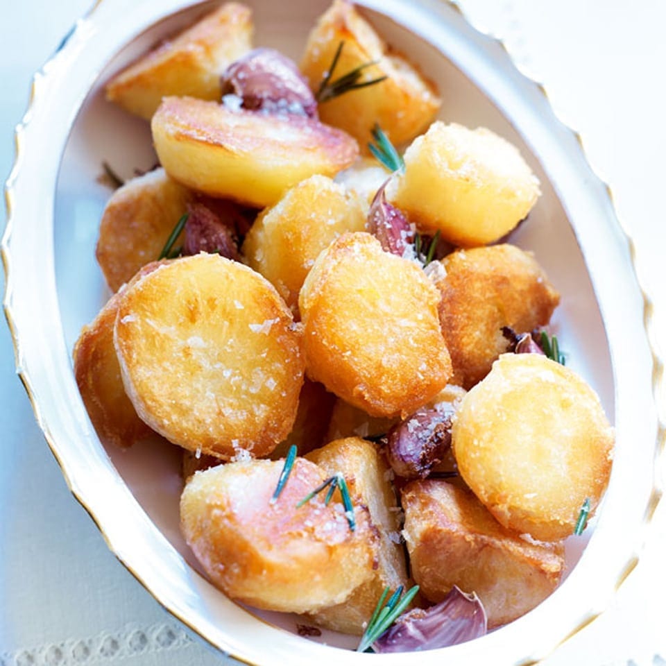 Classic roasties with garlic and rosemary recipe | delicious. magazine