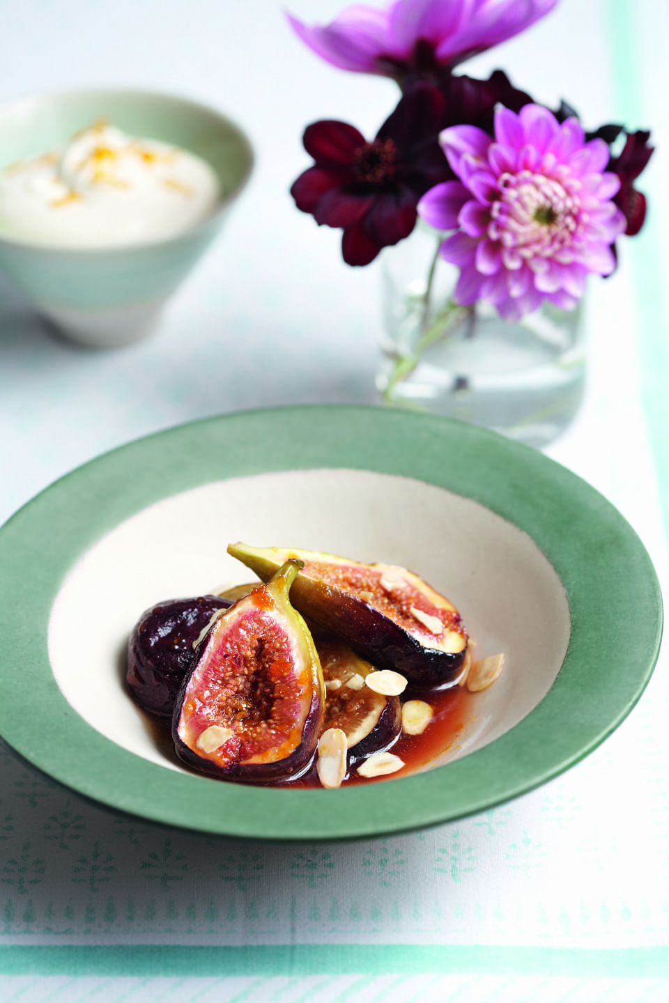 Baked honey figs with toasted almonds and vanilla cream recipe | delicious. magazine
