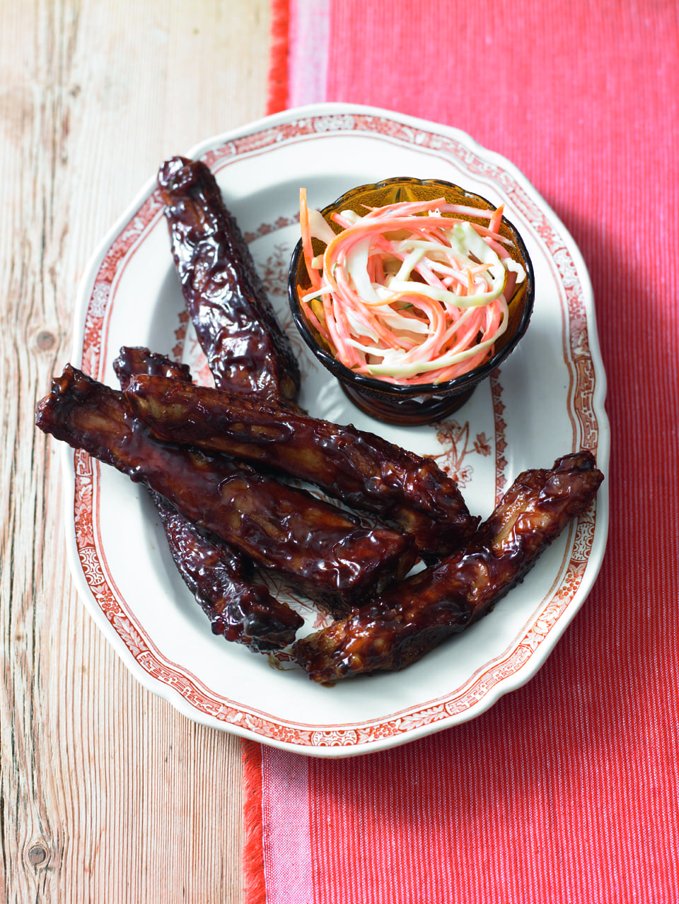 Sticky hoisin pork ribs with coleslaw recipe | delicious. magazine