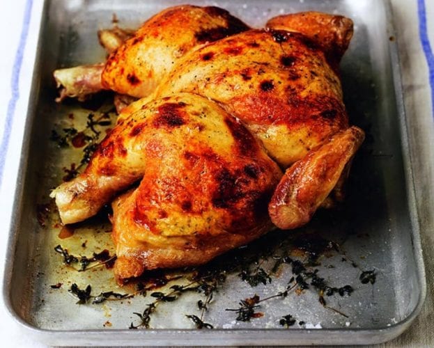 Spatchcocked crispy-skin chicken with herbs, lemon and garlic