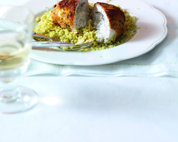 Stuffed chicken breasts with stir-fried kale and hazelnuts
