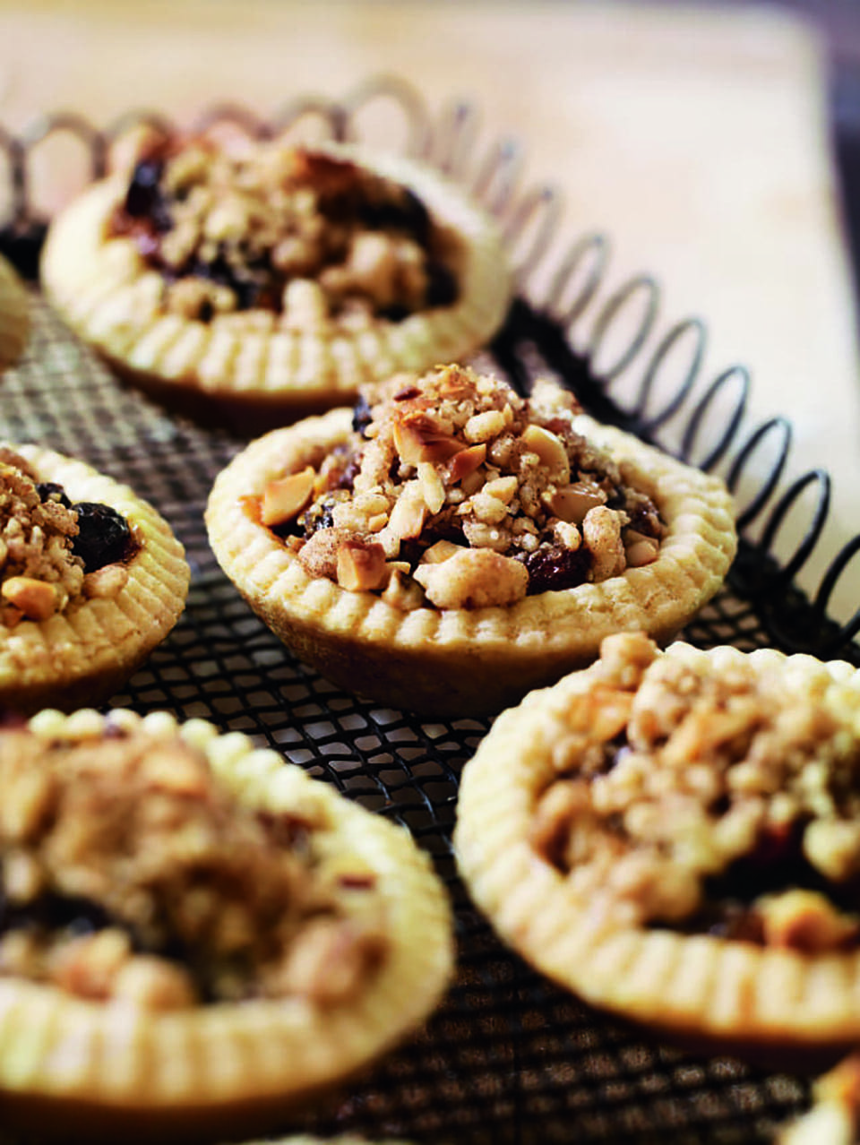 Mince pies with streusel topping recipe | delicious. magazine