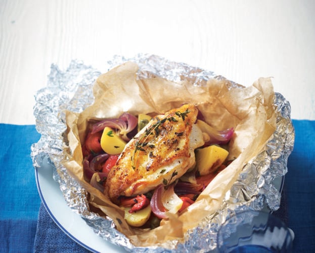 Low-fat fish parcels with creamy spring onions and chilli