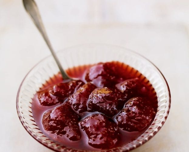 Strawberry jam in a glass bowl