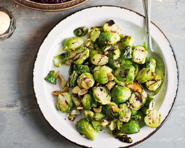 Sprouts and roasted carrots with butter and macadamia nuts