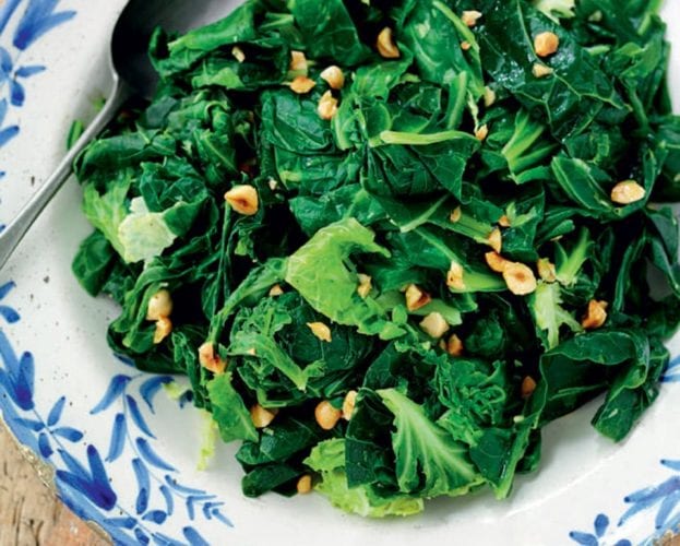 Sprout tops with browned butter and hazelnuts
