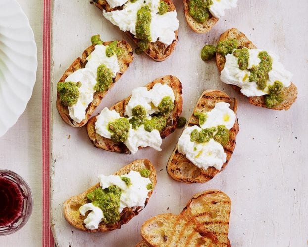 Mozzarella bruschetta with rocket drizzle