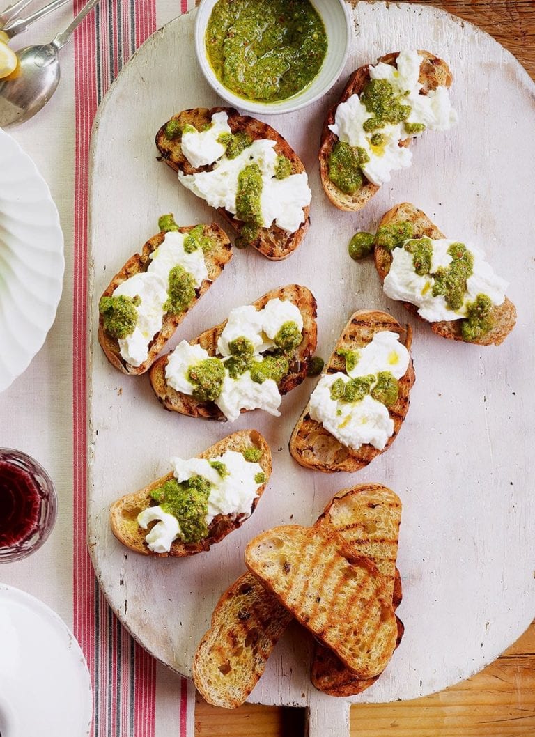 Mozzarella bruschetta with rocket drizzle