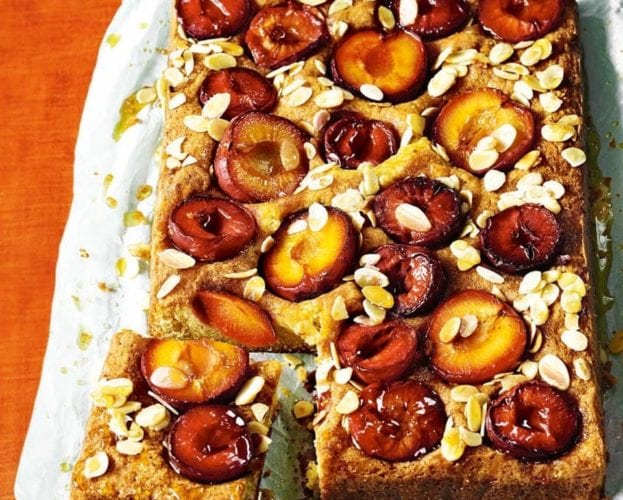 Plum cake with custard, shown on baking paper