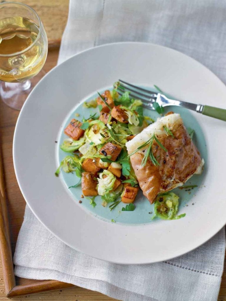 Parma ham-wrapped fish with sprout and sweet potato hash