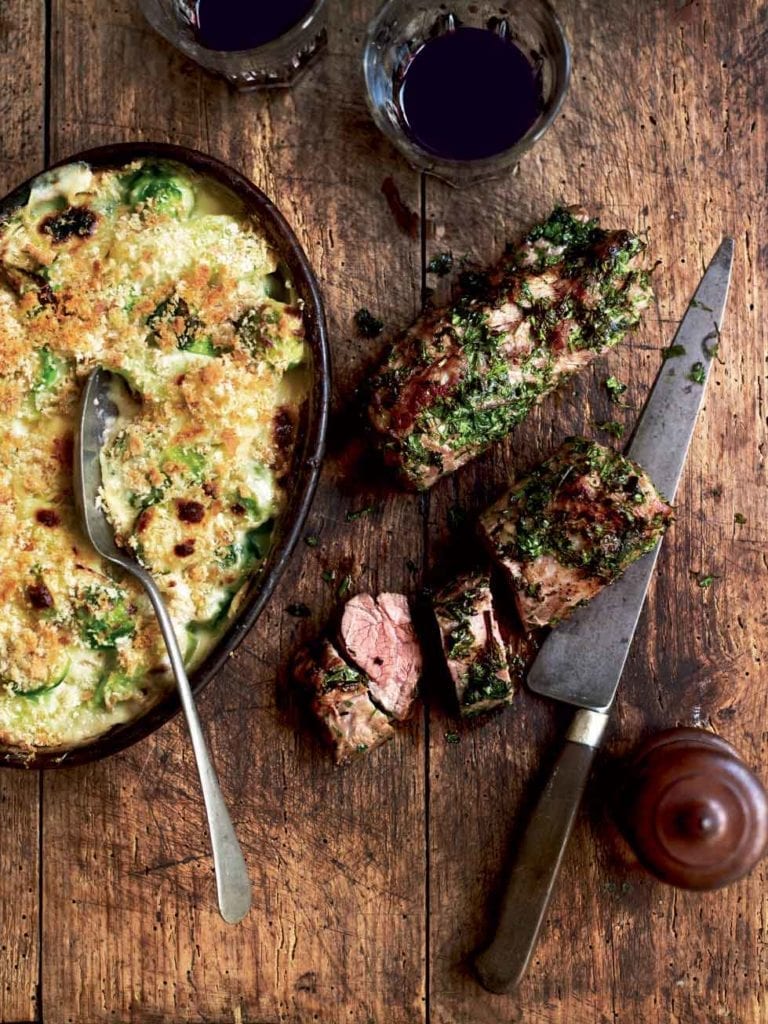 Herb-crusted lamb with a gratin of leeks and brussels sprouts