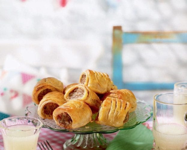 Sausage rolls with a ham and cheddar crust