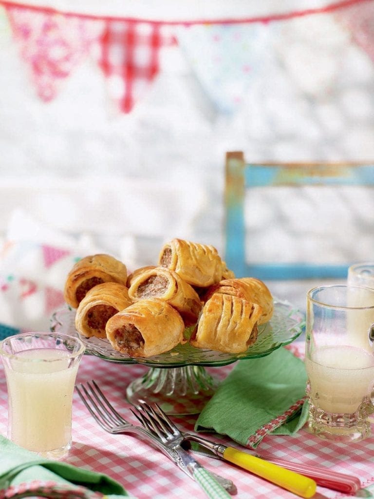 Sausage rolls with a ham and cheddar crust