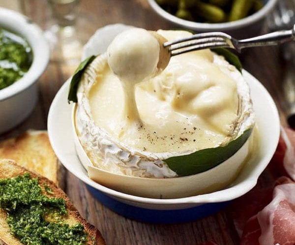 Baked cheese with herb pesto