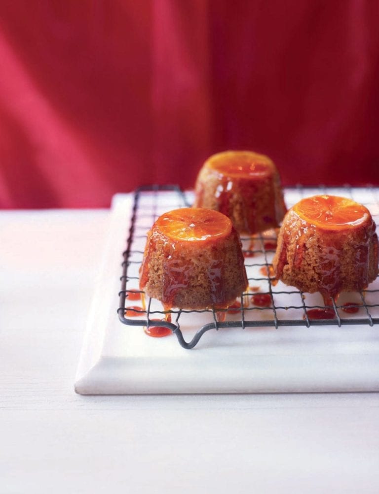 Sticky clementine steamed puddings