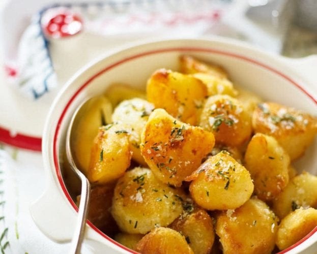 Roast potatoes with herb salt in a bowl