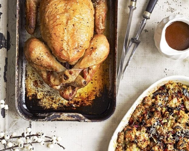 Roast chicken with sausage, chard and parmesan stuffing