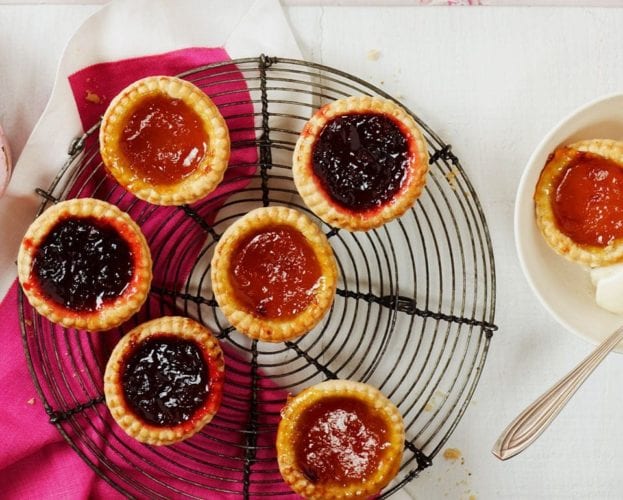 Jam tarts on a wire rack