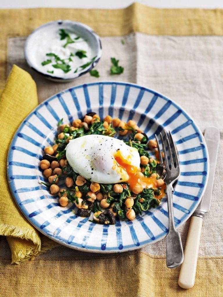 Poached eggs with harissa chickpeas and garlic yogurt