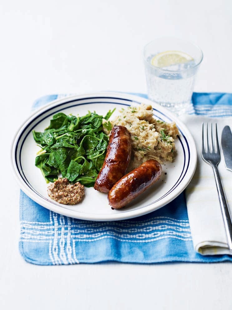 Sausages with cheesy butter bean mash
