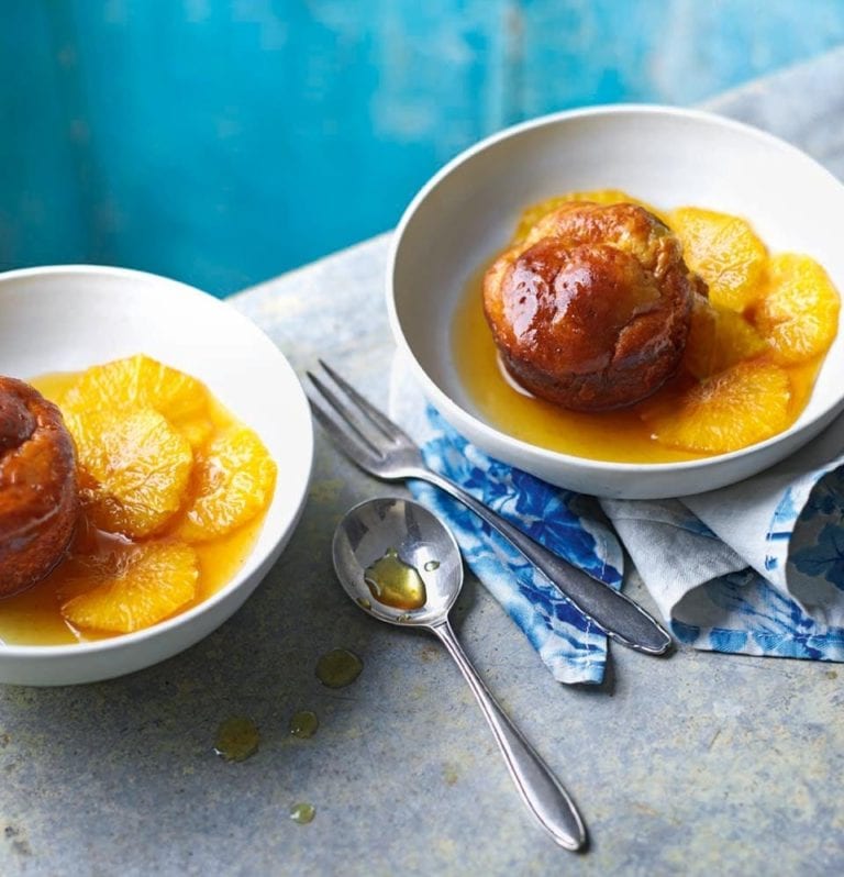 Orange and ginger rum babas with caramelised oranges and ginger