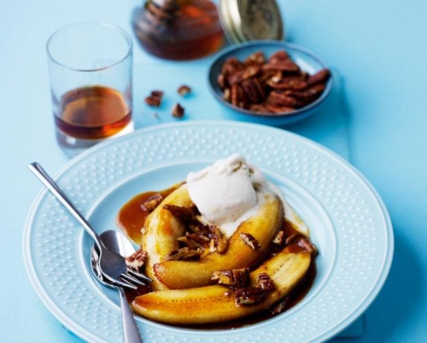 Maple and rum baked bananas with toasted hazelnuts and pistachios