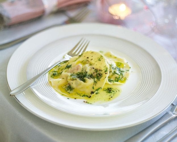 Hot-smoked salmon ravioli with dill butter sauce