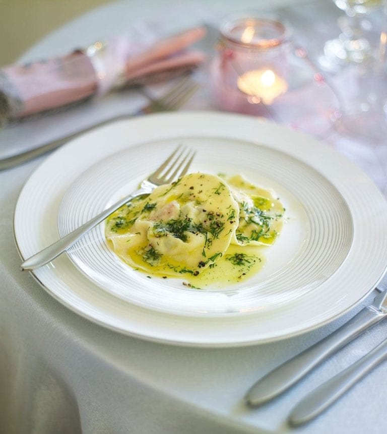 Hot-smoked salmon ravioli with dill butter sauce