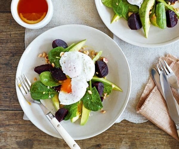 Poached eggs with avocado, beetroot and spinach